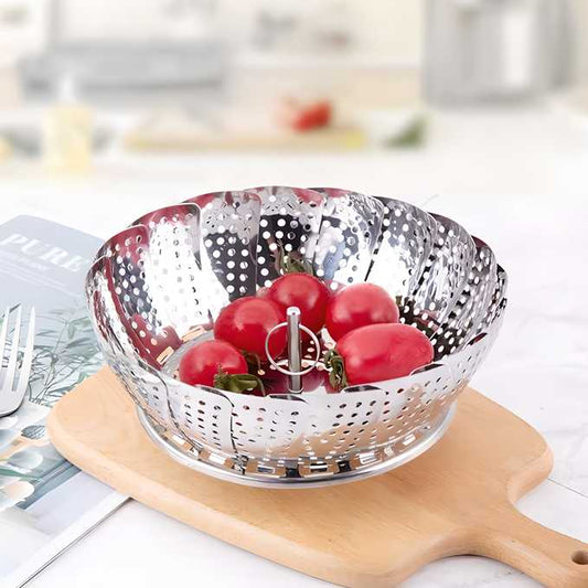 steel steamer basket with tomato in it