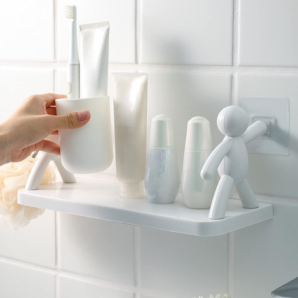 a woman hand putting brush and toothpaste on shelf