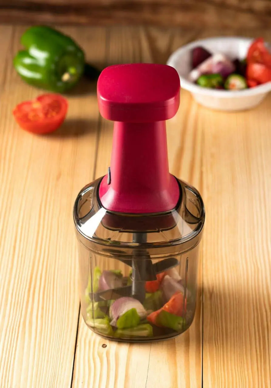 hand press food chopper shown in red color