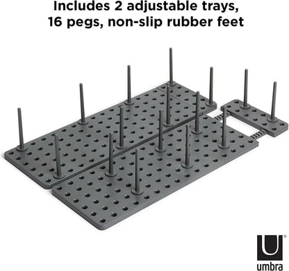 includes 2 adjustable trays, 16 pegs, non slip rubber feet